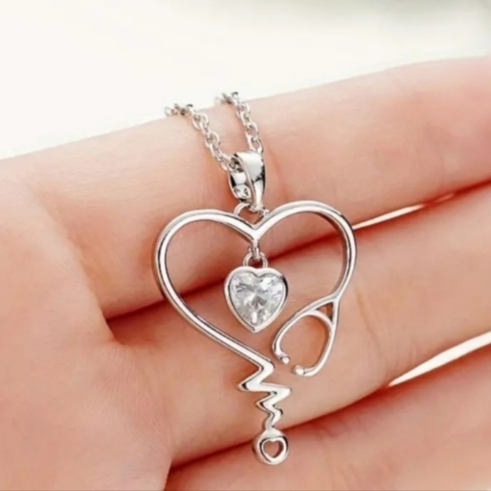 925 Silver hallowed heart zircon  necklace. New. Fast Ship. Pretty!